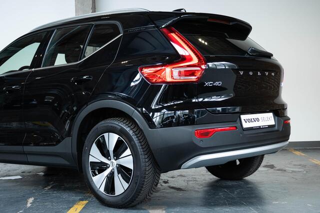 Volvo XC40 T4 Recharge Inscription | 360° Parkeercamera | Semi Electrische Wegklapbare trekhaak | 4-Seizoenenbanden | Draadloze telefoonlader | Panoramadak | Harman Kardon Premium Audio | Stoel en Stuurwielverwarming | Parkeersensoren voor + achter | Parkeerverwarmi
