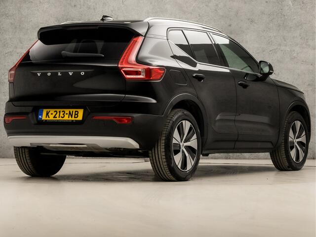 Volvo XC40 1.5 T4 Recharge R-Design Expression 211Pk Automaat (APPLE CARPLAY, GROOT NAVI, STUUR/STOELVERWARMING, ZWART HEMEL, CAMERA, SPORTSTOELEN, ADAPTIVE CRUISE, TREKHAAK, KEYLESS, NIEUWSTAAT)