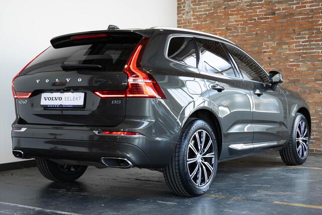 Volvo XC60 B5 Automaat Business Pro | 360° parkeercamera | Adaptive cruise control | BLIS | Stoelverwarming | Stuurwielverwarming | Navigatie | Maroon lederen bekleding | Comfortstoelen |