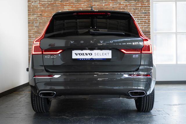 Volvo XC60 B5 Automaat Business Pro | 360° parkeercamera | Adaptive cruise control | BLIS | Stoelverwarming | Stuurwielverwarming | Navigatie | Maroon lederen bekleding | Comfortstoelen |