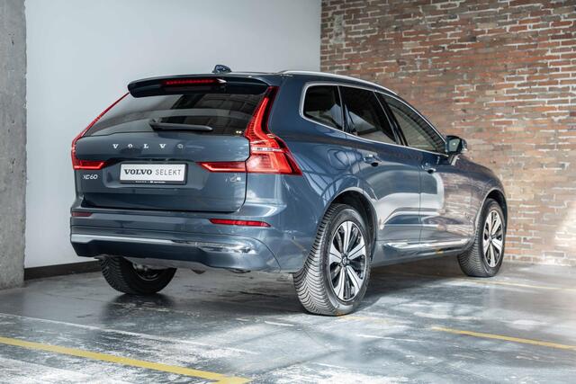 Volvo XC60 T6 Plug-in hybrid AWD Plus Bright | 4-seizoenenbanden | Google infotainment | 360° Parkeercamera | Harman Kardon premium audio | Semi Electrische trekhaak | Panoramadak | Parkeersensoren voor + achter | Longe Range | Electrische bedienbare voorstoelen met