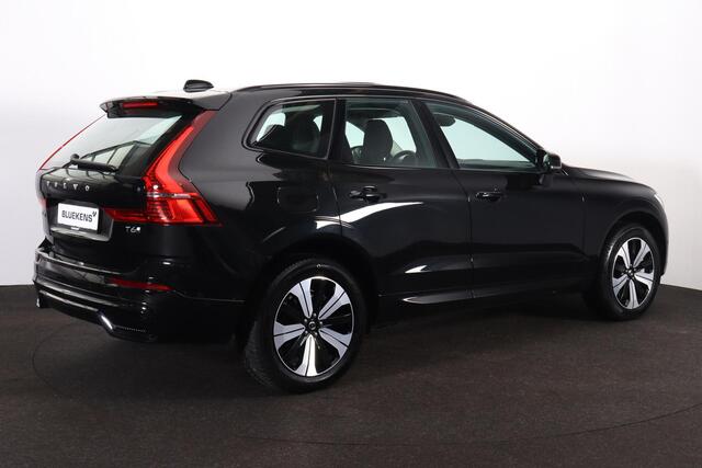 Volvo XC60 T6 Recharge AWD Plus Dark - Panorama/schuifdak - IntelliSafe Assist & Surround - 360º Camera - Verwarmde voorstoelen, stuur & achterbank - Parkeersensoren voor & achter - Elektr. bedienb. voorstoelen met geheugen - Draadloze tel. lader - Elektr. inklapbar