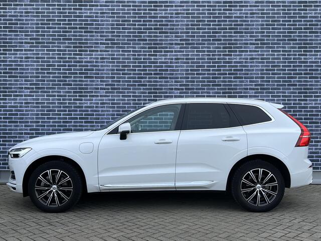 Volvo XC60 2.0 T8 Twin Engine AWD Inscription | Trekhaak | Nappaleder | Stoelventilatie | Panoramadak | Head-up Display | Achteruitrijcamera | Parkeersensoren | Keyless Entry | Elektrische Achterklep | Elektrisch Verstelbare Voorstoelen | Cruise Control Adaptief | B
