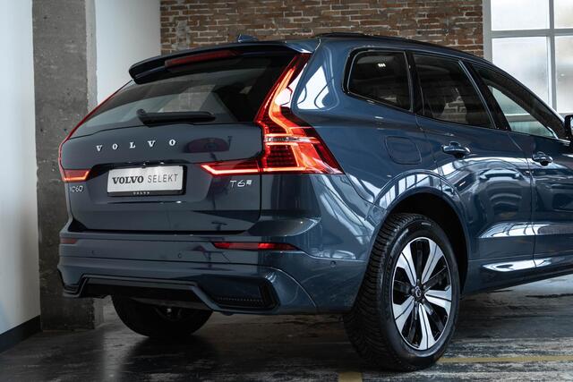 Volvo XC60 T6 Plug-in hybrid AWD Plus Dark | Adaptive cruise control | 360° parkeercamera | BLIS | Wegklapbare trekhaak | Panoramadak | Stoel en stuurwielverwarming | Lederen bekleding | Google infotainment | Parkeersensoren voor + achter