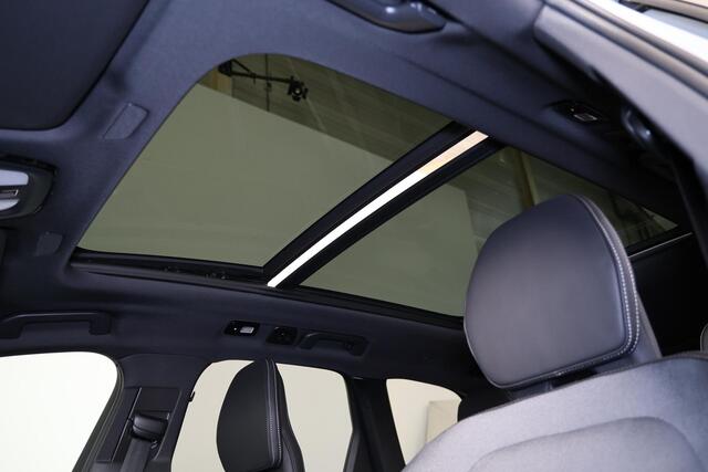 Volvo XC60 T6 Recharge AWD Plus Black Edition - Panorama/schuifdak - IntelliSafe Assist & Surround - 360º Camera - Harman/Kardon audio - Verwarmde voorstoelen, stuur & achterbank - Parkeersensoren voor & achter - Elektr. bedienb. voorstoelen met geheugen - Head up d