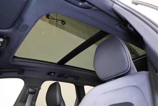 Volvo XC60 T6 Recharge AWD Plus Black Edition - Panorama/schuifdak - IntelliSafe Assist & Surround - Harman/Kardon audio - Parkeercamera achter - Verwarmde voorstoelen, stuur & achterbank - Parkeersensoren voor & achter - Elektr. bedienb. voorstoelen met geheugen -