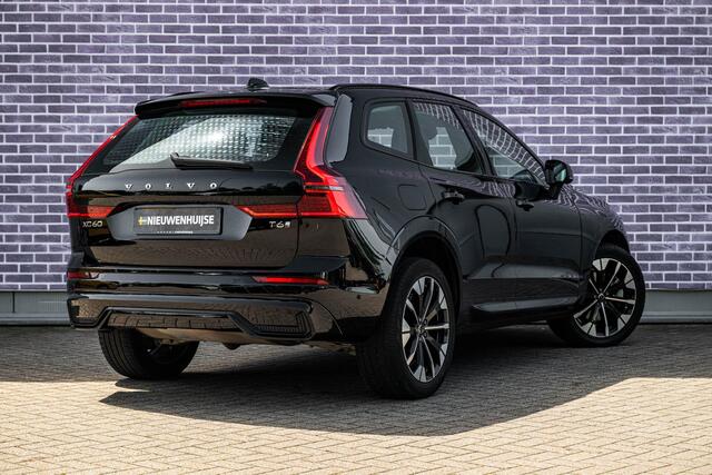 Volvo XC60 2.0 T6 Plug-in hybrid AWD Ultra Dark | Stoel-/Stuurverwarming | Getint Glas | Head-up Display | Adaptieve Cruise Control | Luchtvering | Trekhaak | BLIS |