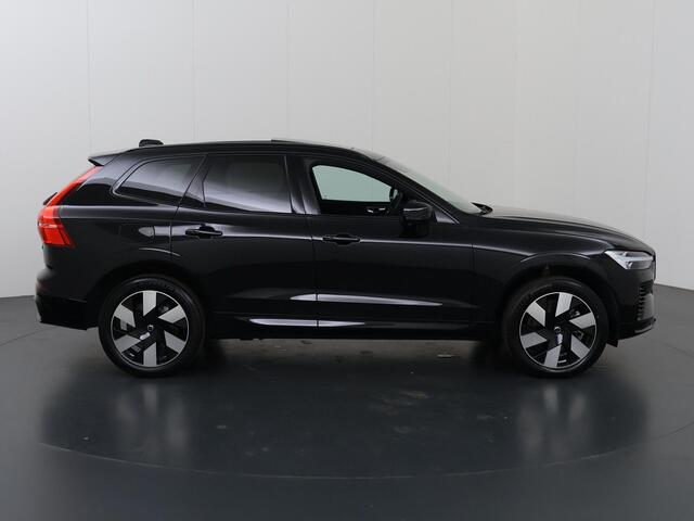 Volvo XC60 2.0 T8 Plug-in hybrid AWD Plus Dark Achterbank verwarming | Achteruitrij assistent | Camera | Apple CarPlay/Android Auto | Comfortstoelen | Adaptieve Cruise Control | DAB | Draadloze Telefoonlader | Panoramadak | Ele. verstelbare stoel + geheugen | Stuur/