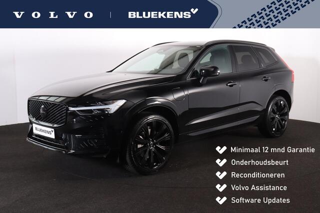 Volvo XC60 2.0 T6 Plug-in hybrid AWD Essential - Black Edition - Fiscale waarde € 64.581 - IntelliSafe Assist & Surround - Verwarmde voorstoelen, stuur & achterbank - Parkeersensoren & camera achter - Draadloze tel. lader - Extra getint glas -Donkere hemel - 21 inch LMV