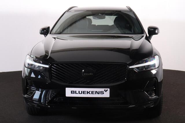 Volvo XC60 2.0 T6 Plug-in hybrid AWD Essential - Black Edition - Fiscale waarde € 64.581 - IntelliSafe Assist & Surround - Verwarmde voorstoelen, stuur & achterbank - Parkeersensoren & camera achter - Draadloze tel. lader - Extra getint glas -Donkere hemel - 21 inch LMV