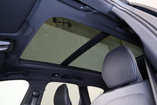 Volvo XC60 T6 Recharge AWD Plus Black Edition - Panorama/schuifdak - IntelliSafe Assist & Surround - 360º Camera - Harman/Kardon audio - Verwarmde voorstoelen, stuur & achterbank - Parkeersensoren voor & achter - Elektr. bedienb. voorstoelen met geheugen - Head up display - Draadloze tel. lader - Extra getint glas - 21' LMV