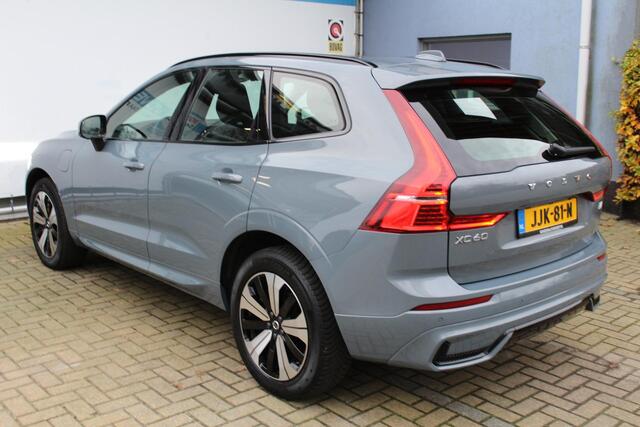 Volvo XC60 2.0 T6 Plug-in hybrid AWD Plus Dark | Incl. 12 maanden Garantie | SoH 96% | Panorama dak | Keyless entry/start | Achteruitrijcamera | Elektrische kofferbakklep | Memory stand stoelen | Adaptive cruise | Apple CarPlay/Android Auto | Climate controle | Draadloze telefoonlader | Lederen bekleding |
