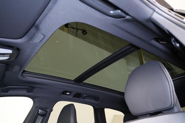 Volvo XC60 T6 Recharge AWD Plus Black Edition - Panorama/schuifdak - IntelliSafe Assist & Surround - 360º Camera - Harman/Kardon audio - Verwarmde voorstoelen, stuur & achterbank - Parkeersensoren voor & achter - Elektr. bedienb. voorstoelen met geheugen - Head up display - Draadloze tel. lader - Extra getint glas - 21' LMV