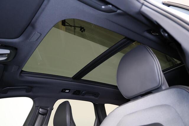 Volvo XC60 T6 Recharge AWD Plus Black Edition - Panorama/schuifdak - IntelliSafe Assist & Surround - 360º Camera - Harman/Kardon audio - Verwarmde voorstoelen, stuur & achterbank - Parkeersensoren voor & achter - Elektr. bedienb. voorstoelen met geheugen - Head up display - Draadloze tel. lader - Extra getint glas - 21' LMV