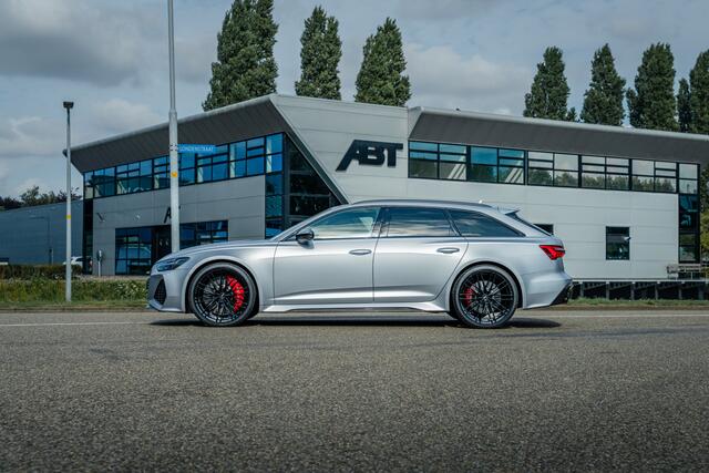 Audi RS6 Avant 4.0 TFSI ABT ABT HR22 Glossy Black | Audi Exclusive | Carbon optiek | Dynamic plus | Keramische remmen | Design pakket rood | Alcantara hemel | Panorama dak | Assistentiepakket plus B&O Premium audio | Carbon spiegels | Carnon interieur | HD Matrix 