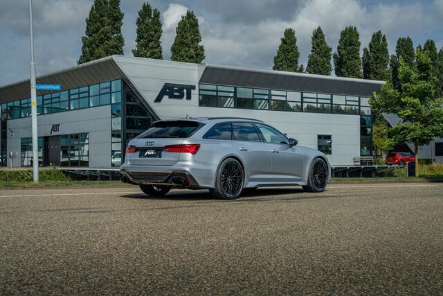 Audi RS6 Avant 4.0 TFSI ABT ABT HR22 Glossy Black | Audi Exclusive | Carbon optiek | Dynamic plus | Keramische remmen | Design pakket rood | Alcantara hemel | Panorama dak | Assistentiepakket plus B&O Premium audio | Carbon spiegels | Carnon interieur | HD Matrix 