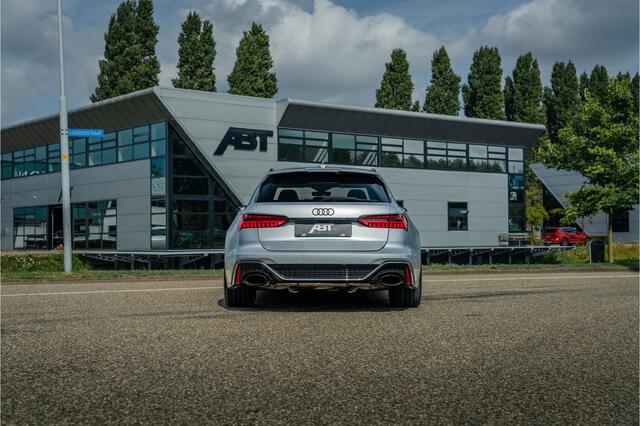 Audi RS6 Avant 4.0 TFSI ABT ABT HR22 Glossy Black | Audi Exclusive | Carbon optiek | Dynamic plus | Keramische remmen | Design pakket rood | Alcantara hemel | Panorama dak | Assistentiepakket plus B&O Premium audio | Carbon spiegels | Carnon interieur | HD Matrix 