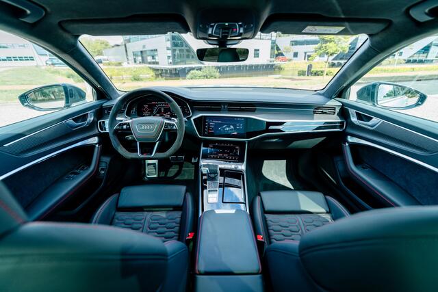 Audi RS6 Avant 4.0 TFSI ABT ABT HR22 Glossy Black | Audi Exclusive | Carbon optiek | Dynamic plus | Keramische remmen | Design pakket rood | Alcantara hemel | Panorama dak | Assistentiepakket plus B&O Premium audio | Carbon spiegels | Carnon interieur | HD Matrix 