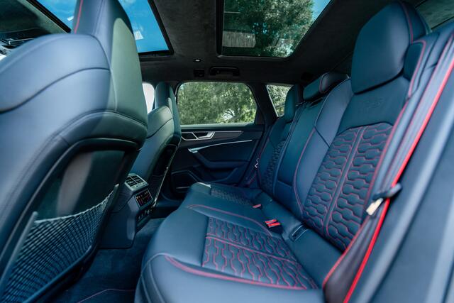 Audi RS6 Avant 4.0 TFSI ABT ABT HR22 Glossy Black | Audi Exclusive | Carbon optiek | Dynamic plus | Keramische remmen | Design pakket rood | Alcantara hemel | Panorama dak | Assistentiepakket plus B&O Premium audio | Carbon spiegels | Carnon interieur | HD Matrix 