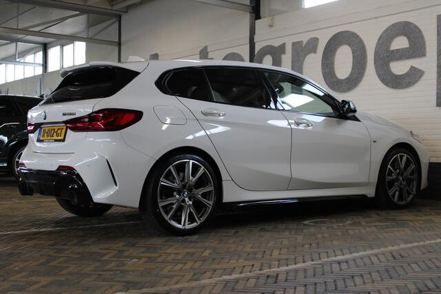 BMW 1-SERIE M135i xDrive High Executive | Akrapovic uitlaatsysteem | Cruise control | Climate control | Stoelverwarming | Apple carplay/Android auto | DAB radio | Dealer onderhouden |