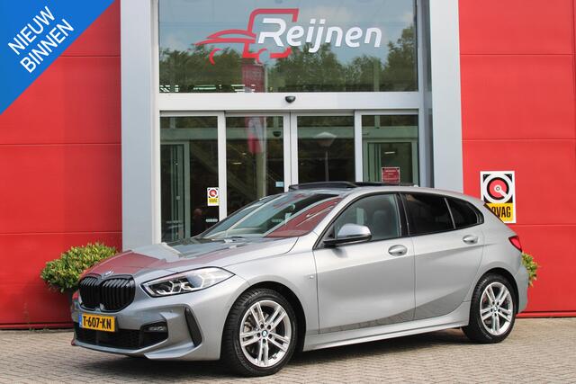 BMW 1-SERIE 118i 136PK INTRODUCTION EDITION M-SPORT | PANORAMISCH SCHUIF/KANTEL DAK | SHADOW LINE PAKKET | SFEER VERLICHTING | LEDEREN BEKLEDING "DAKOTA GEPERFOREERD" | ACHTERUITRIJ CAMERA | PARKEERSENSOREN VOOR EN ACHTER | ALARM | STOEL VERWARMING | DRAADLOZE APPLE