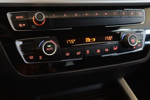 BMW 1-SERIE 118i Executive Automaat | NAVI | CLIMA | PDC ACHTER | CRUISE | LEER |