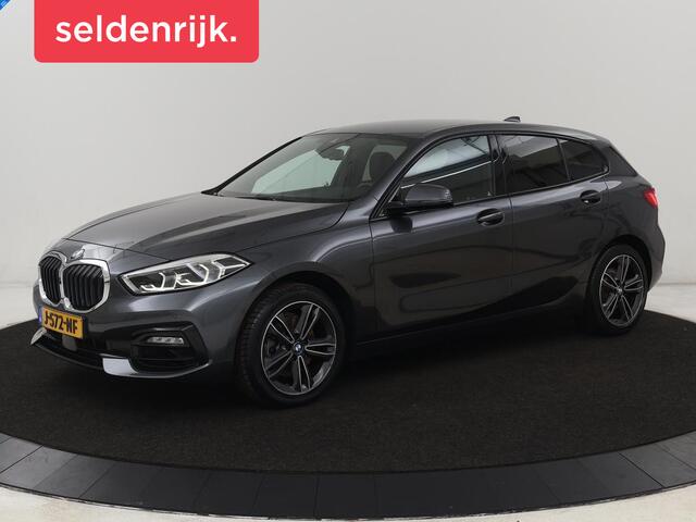 BMW 1-SERIE 118i Executive | Sport Line | Camera | Carplay | Sportstoelen | Live Cockpit | Navigatie | Full LED | Climate control | Sfeerverlichting | Cruise control | Park Assist | Bluetooth | Getint glas