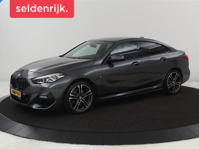 BMW 2-SERIE 218i M Sport | Sportstoelen | Camera | Carplay | Live Cockpit | Half leder | Navigatie | Sfeerverlichting | Full LED | Climate control