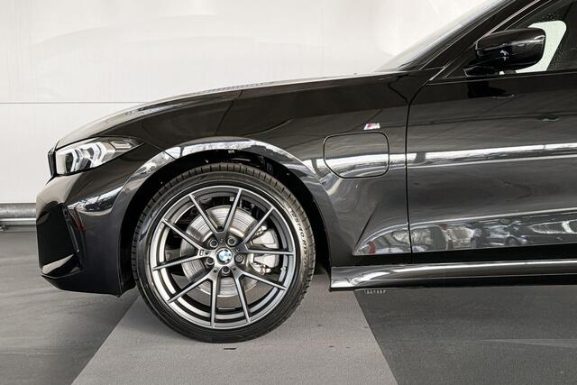 BMW 3-SERIE Touring 320e | M Sportpakket | Trekhaak met elektrisch wegklapbare kogel