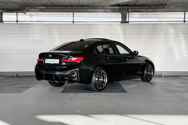 BMW 3-SERIE Touring 320e | M Sportpakket | Trekhaak met elektrisch wegklapbare kogel