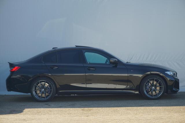 BMW 3-SERIE Sedan 320e M Sportpakket 19'' / Schuif-/kanteldak / Stuurwielrand verwarming / Carbon M Performance pakket