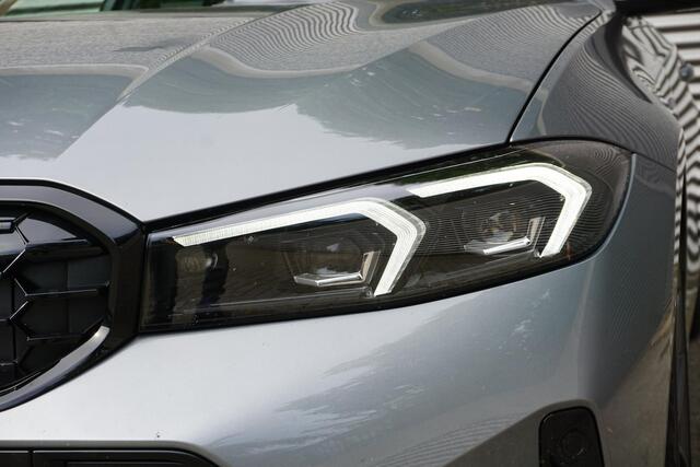 BMW 3-SERIE Touring 330e M Sportpakket Pro | Comfort Pack | HiFi System | Extra getint glas in achterportierruiten en achterruit | Achteruitrijcamera