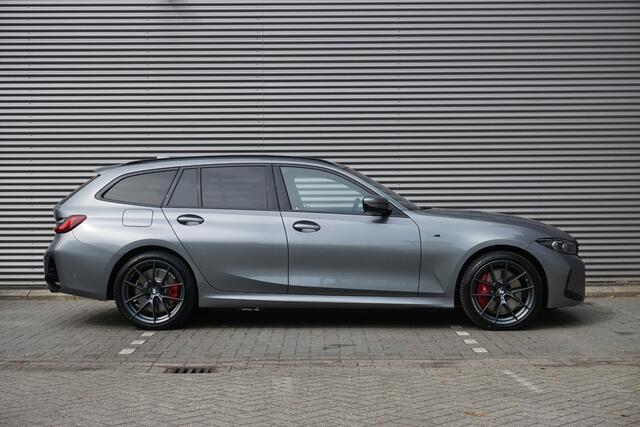 BMW 3-SERIE Touring 330e M Sportpakket Pro | Comfort Pack | HiFi System | Extra getint glas in achterportierruiten en achterruit | Achteruitrijcamera