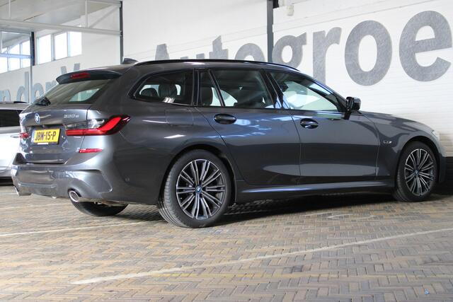 BMW 3-SERIE Touring 330e Business Edition Plus Adaptieve cruise control | Climate control | Stoel/stuur verwarming | Zomer + winterset | Elektrisch uitklapbare trekhaak | Parkeercamera |