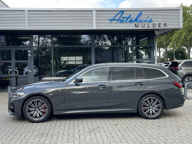 BMW 3-SERIE Touring 330e High Executive M-pakket/Panoramadak/Navigatie/Leder