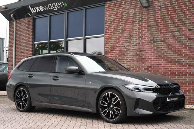 BMW 3-SERIE Touring 330e xDrive M-Sport Pro LCI Dravitgrau Pano HUD el-zetels 19inch