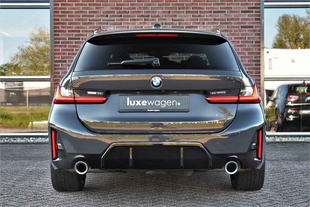 BMW 3-SERIE Touring 330e xDrive M-Sport Pro LCI Dravitgrau Pano HUD el-zetels 19inch