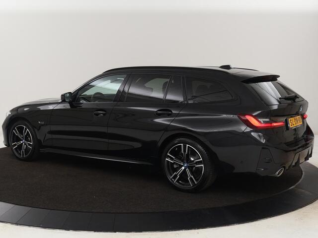 BMW 3-SERIE Touring 330e Business Edition Plus | Wegklapbare trekhaak | Camera | Stoel & Stuurverwarming | Carplay | Leder
