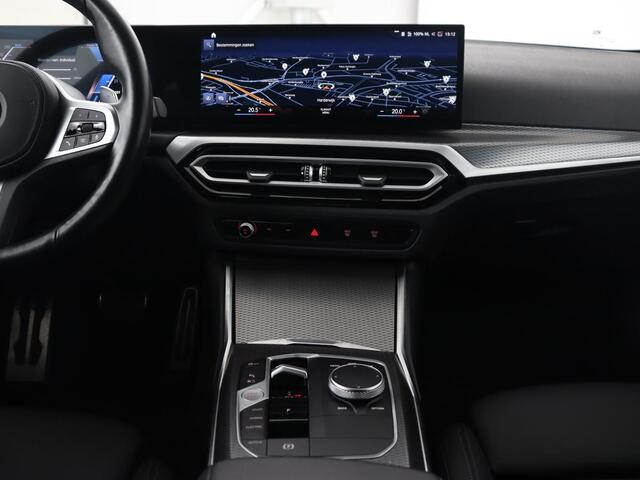 BMW 3-SERIE Touring 330e Business Edition Plus | Wegklapbare trekhaak | Camera | Stoel & Stuurverwarming | Carplay | Leder
