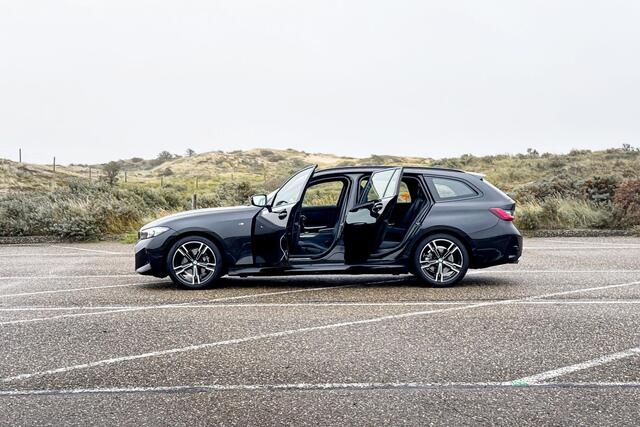 BMW 3-SERIE Touring 318i | M Sport | Stoelverwarming | Trekhaak |