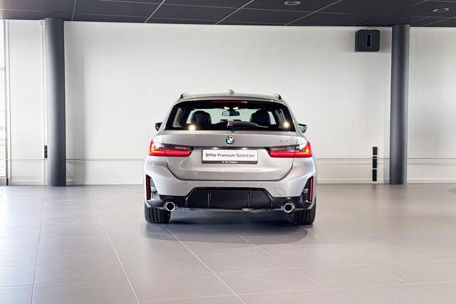 BMW 3-SERIE Touring 318i | M Sport | Stoelverwarming | Achteruitrijcamera | Trekhaak |