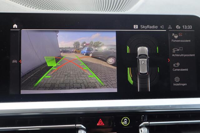 BMW 3-SERIE Touring 320i Executive Edition Navigatie, Panoramadak, Apple Carplay, Camera, Cruise control