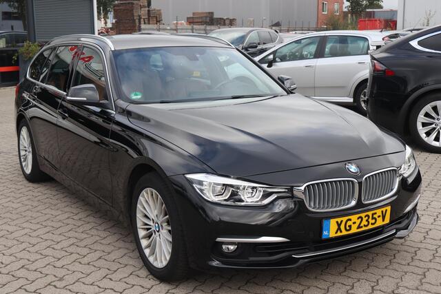 BMW 3-SERIE Touring 320i Luxury Edition (NL auto), Navigatie, Lederen interieur, Cruise control, Climate control, Stoelverwarming