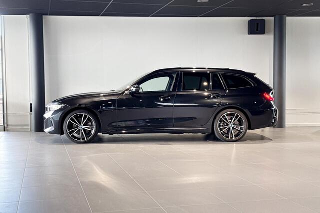 BMW 3-SERIE Touring 320e | M Sport | Glazen Panoramadak | Stoelverwarming | Comfort Access | HIFI |