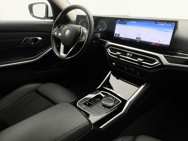 BMW 3-SERIE Touring 320e xDrive Business Edition | PANO | CAMERA | KEYLESS | HUD | STOELVERW. | TREKHAAK