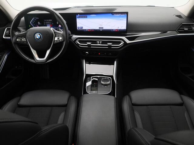 BMW 3-SERIE Touring 320e xDrive Business Edition | PANO | CAMERA | KEYLESS | HUD | STOELVERW. | TREKHAAK