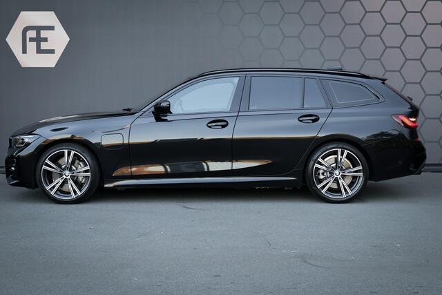 BMW 3-SERIE Touring 330e Business Edition Plus | STOELVERWARMING | CRUISE CONTROL | ACHTERUITRIJCAMERA | APPLE CARPLAY | SFEERVERLICHTING | ORIGINEEL NEDERLANDS |