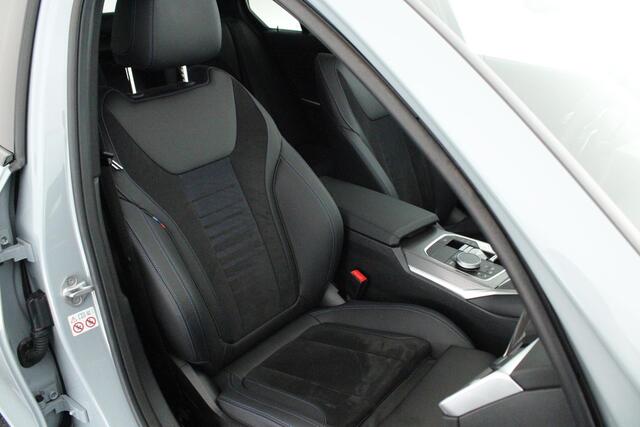 BMW 3-SERIE 320e 204pk M-Sport Trekhaak Camera Keyless Memory Schuifdak Navigatie