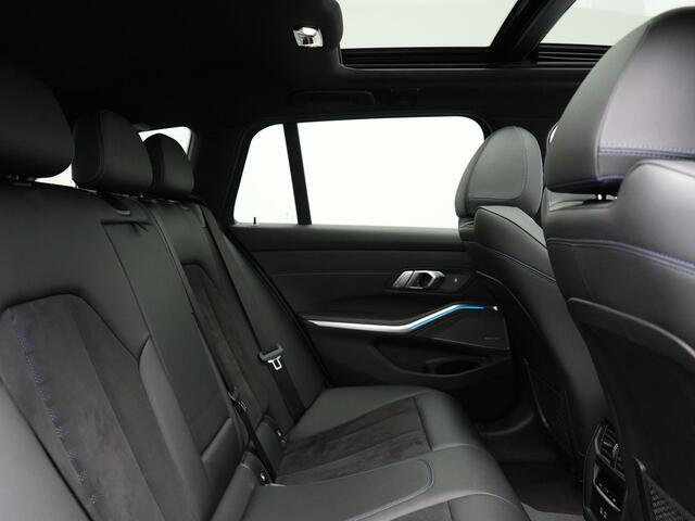 BMW 3-SERIE Touring 330e xDrive M Sport Plug In Hybrid 293pk Dealer O.H. PHEV | Trekhaak Af Fabriek | Panodak | Harman & Kardon | Adaptief Onderstel | Camera | Alcantara Sportstoelen Verwarmd | Sfeerverlichting | Apple Carplay | Stuur Verwarmd | Navigatie | DAB |