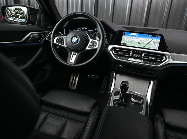 BMW 4-SERIE Gran Coupé M440i xDrive HIGH EXECUTIVE | M-SPORT PAKKET | SHADOW LINE | COMFORT ACCESS | MEMORY SEATS | HEAD-UP DISPLAY | ADAPTIVE CRUISE | VIRTUAL COCKPIT | STOEL - EN STUURVERWARMING | ACHTERBANK VERWARMING | EL. TREKHAAK